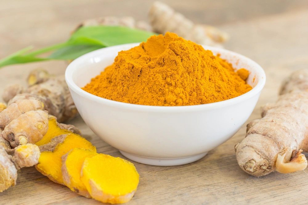 Turmeric fingers and powder golden